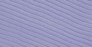 Texture of smooth knitted sweater with pattern. Handmade knitting wool or cotton fabric texture. Background of knitting patterns with horizontal stripes. photo