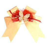 gold gift ribbon and bow on white background with clipping path photo