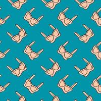 Creme colored bra, seamless pattern on blue background. vector