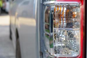 The red and white brake lights and reversing lights of the transport van were broken due to a collision.accident and insurance concept photo