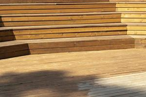 Wooden steps. Place for students to relax. Wooden benches. Scene details. Tribune for speeches. photo