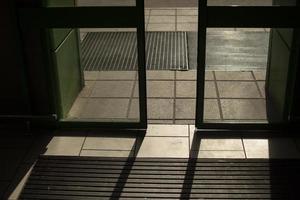 Shop doors open. Automatic doors in building. Transparent flaps. photo