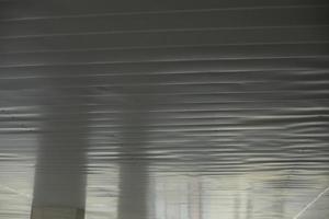 Ceiling of building canopy. White ceiling. Architectural details. photo