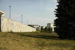 City Park in summer. Wall in park. City on summer day without people. photo