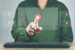 Concept of streaming online. Men's hands showing streaming screen. To represent the use of the Internet online photo