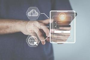 cyber security concept man's hand using a smartphone to the system through the fingerprint scanner Store data into online Cloud Data storag for security. photo