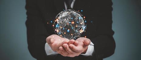 Businessman holding Global network connection. Digital Future communication global network technology concept. photo