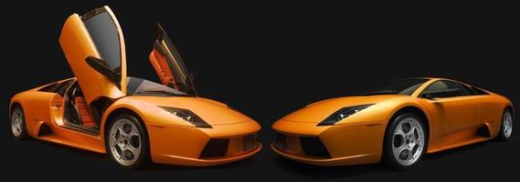 Orange italian sports cars on a blackbackground photo