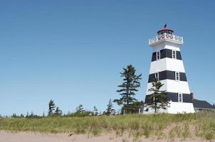 Lighthouse  Prince Edward Island with blue sky photo