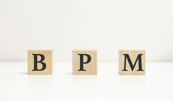 BPM Business Process Management concept, wooden word block on the white background photo