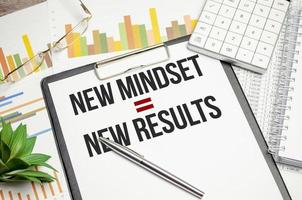 New Mindset - New Results on paper tablet and charts photo