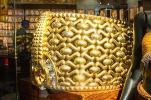 Dubai, UAE, 2022- largest gold ring in the world 21 carat behemoth, weights 64 kb. Cost 3 million USA dollars photo
