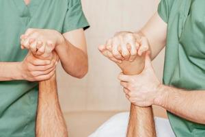 Man receiving toe massage. photo