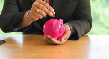 piggy bank on table with space photo