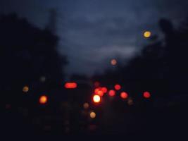 Defocused blurred abstract background of traffic jam at night in east Jakarta. photo