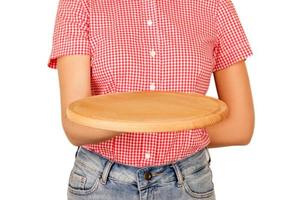 girl waiter holding a wooden empty board. perspective view isolated on white background. Template for your design photo