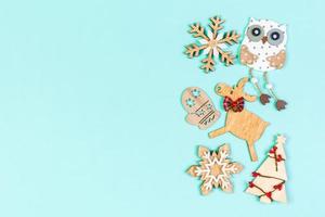 Top view of Christmas decorations on colorful background. New Year composition concept with empty space for your design photo