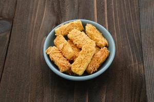 Crunchy kaastengels cookies. Dutch influenced Indonesian cookies, typically served during hari raya Eid Fitri. photo