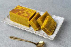 Lapis Legit, Spekuk, Spekkoek, is a delicious Indonesian cake, consists of many layers. photo
