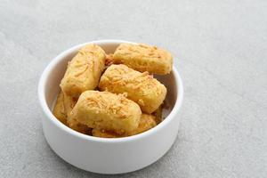 Crunchy kaastengels cookies. Dutch influenced Indonesian cookies, typically served during hari raya Eid Fitri. photo