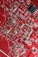 Electronic circuit board close up. Processor, chips and capacitors. photo