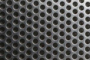 Silver metal shaped like a honeycomb for design background. photo