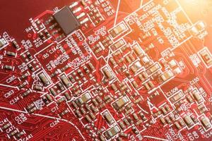 Electronic circuit board close up. Processor, chips and capacitors. photo