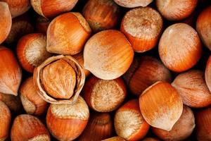 Hazelnuts. Stack of hazelnuts. Food background. Hazelnut background. Hazelnuts in shells background photo