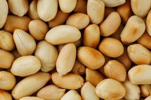 Peanut texture. food background of peanuts beans. photo