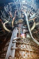 Gas turbine engine of feed gas compressor located inside pressurized enclosure, The gas turbine engine used in offshore oil and gas central processing platform. photo