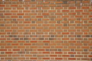 Red brick wall background outside of the building, London, UK. photo