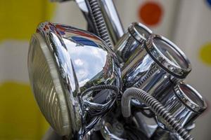 Closeup of an old vintage bicycle headlight in Italy. photo