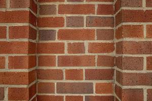 Red brick wall background outside of the building, London, UK. photo