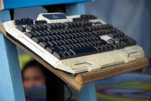 keyboard that is placed outdoors and on display photo