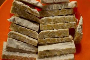 tempeh in a plastic container that is placed on the table photo