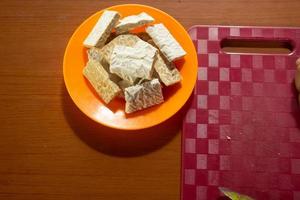 tempeh in a plastic container that is placed on the table photo