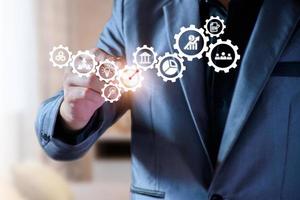 Business database analysis concept. Businessman analyzing economic data. related to business operations, analysis of future economic trends, virtual screens, business networking, internet technology. photo