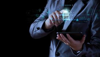 Cyber security concept. Businessman unlocking to access digital data in internet, business sensitive data lock, padlock, data security, top secret, digital files, corporate secrets, digital security photo