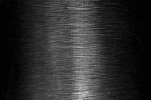 Macro view of silver scratches, metal texture photo