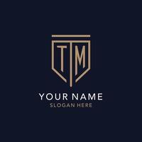 TM initial logo monogram with simple luxury shield icon design vector