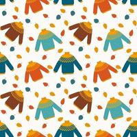 Autumnal seamless pattern with colorful sweater and leaves in flat style vector