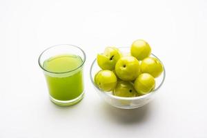 Fresh Gooseberry or Amla Juice or Phyllanthus emblica or avla juice photo