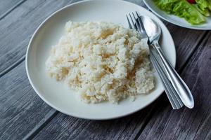 Cooked rice on  a plate photo