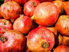 Beautiful red ripe southern natural sweet vitamin delicious ripe oriental bright grenades. Texture, background photo