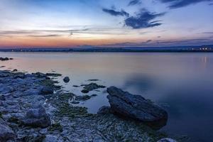 tranquility and calm long exposure sea after sunset photo