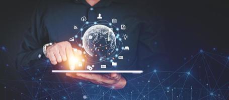 Hand holding virtual Global Internet connection metaverse. Business global internet connection application technology and digital marketing, Financial and banking, Digital link tech, big data. photo