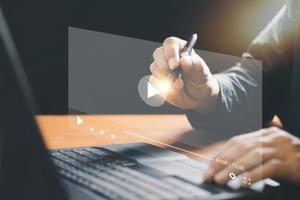 Video streaming on internet concept.,man using mouse and keyboard for streaming online on virtual screen,watching video on internet,watching the movies,live concert, show or tutorial, content online photo