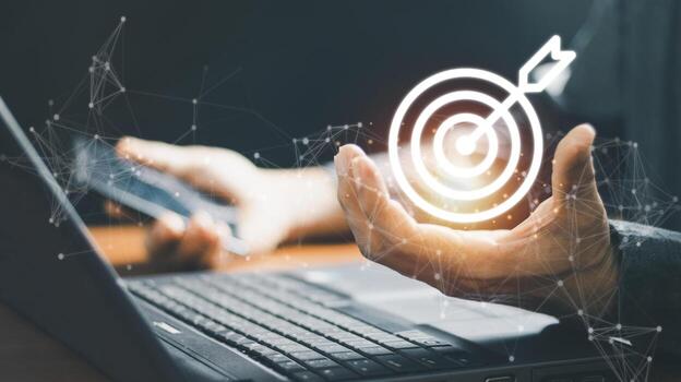 Businessman holding virtual dartboard and arrow with copy space for setup business objective target concept. photo