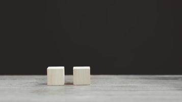 Stack wooden blocks on a dark background photo