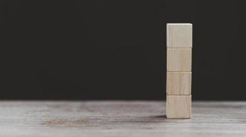 Four blank wooden blocks, cubes isolated on white background, Group of blank wooden blocks, cubes isolated on white, copy space for business text background such as idea, goal, plan concept photo